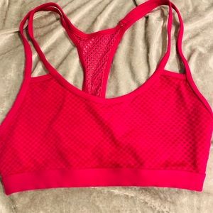 Dark pink sports bra